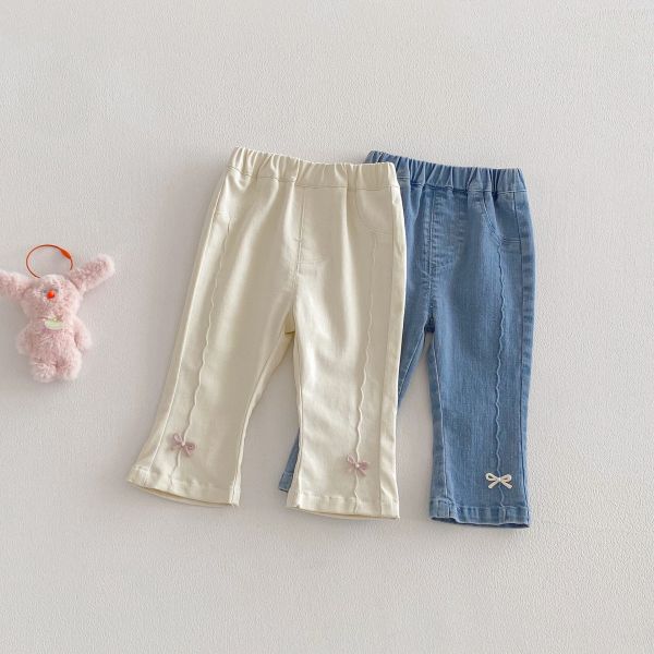 波紋剪裁蝴蝶結兩色牛仔長褲 