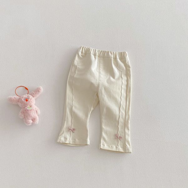 波紋剪裁蝴蝶結兩色牛仔長褲 