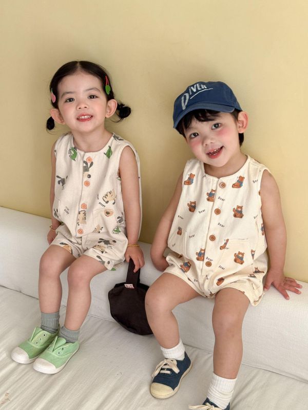 可愛卡通休閒開釦雙口袋連身裝 