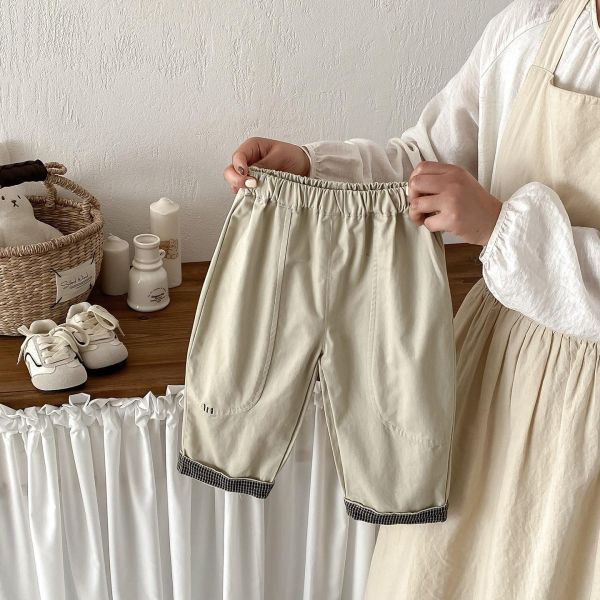 造型反摺格紋素色休閒長褲 