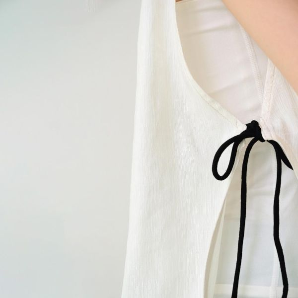 川衣 WEAR BEING｜前短後長絲質拼接背心 