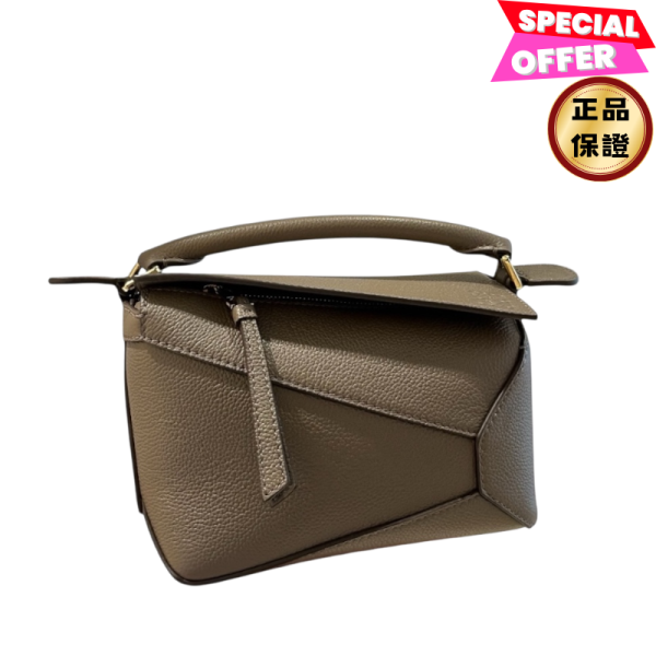 Loewe 柔軟粒面小牛皮 迷你 Edge Puzzle包 太妃糖棕色 Loewe、Puzzle、Loewe包包價格、Loewe包專櫃、Loewe包款評價、Loewe包包尺寸、Loewe專櫃位置、Loewe真品鑑定、小牛皮包、幾何包、輕量包、精品包款、精品包推薦、小型包款推薦、實用包款推薦、精品包評價、精品包價格、平行輸入、精品平行輸入、100%真品、專櫃真品保證、精品折扣、優惠精品價格、限時優惠、快速配送、台灣精品代購、精品包包哪裡買、精品包專櫃價格