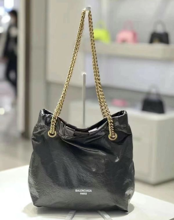 Balenciaga 742942 Crush 小款羊皮束口購物包   黑色/金鍊 Balenciaga 781796 Crush XS 束口購物包 

黑色/金鍊