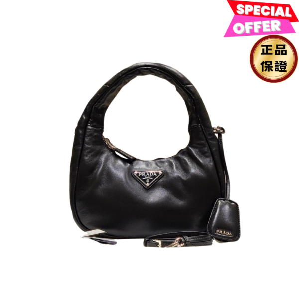Prada Soft 1BA384 軟墊納帕軟皮迷你可頌包  黑色付長肩帶 Prada Soft迷你手袋、納帕軟皮手袋、柔軟奢華手袋
Prada迷你手袋、可調校肩帶手袋、搪瓷金屬三角標誌手袋
Prada Soft納帕手袋、迷你奢華手袋、Prada 1BA384迷你手袋