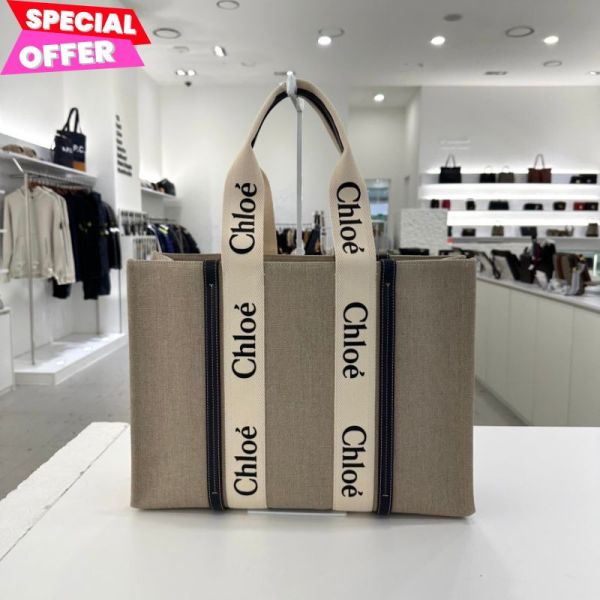 Chloe 大款皮革飾邊絲帶棉質 Woody 包  藍黑色 Chloé Woody 大款托特包,帆布與皮革飾邊設計,時尚大容量手袋,適合通勤、旅行與日常多功能使用。