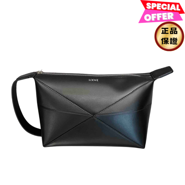 Loewe Puzzle Fold 亮面小牛皮手拿包  黑色 Loewe盥洗包, Puzzle Fold包, 亮面小牛皮包, 幾何線條設計, 黑色小型包, Loewe旅行包, 西班牙製時尚包, 旅行必備精品, 都市高端盥洗包