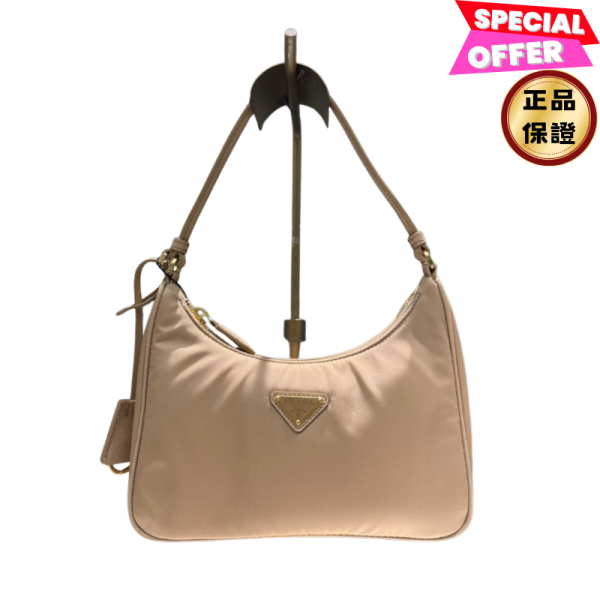 Prada 1N204M Re-Edition 2005 Re-Nylon 肩背包 軟木棕色 Prada迷你包,Re-Edition 2005,Prada Re-Nylon小包,焦糖棕肩背包,義大利精品推薦,Prada三角標誌,精品平行輸入,100%真品,限時精品優惠,輕巧斜背包