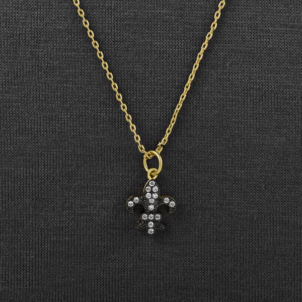 Mini Fer De Li necklace with 14 K matte gold and Black Rhodium plating Mini Fer De Li necklace with 14 K matte gold and Black Rhodium plating