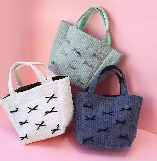 Gypsohila 蝴蝶結絎縫斜背手提袋 