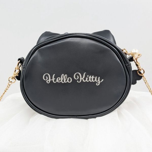 Hello Kitty 金屬質感蝴蝶結側背包（羽翼款） 