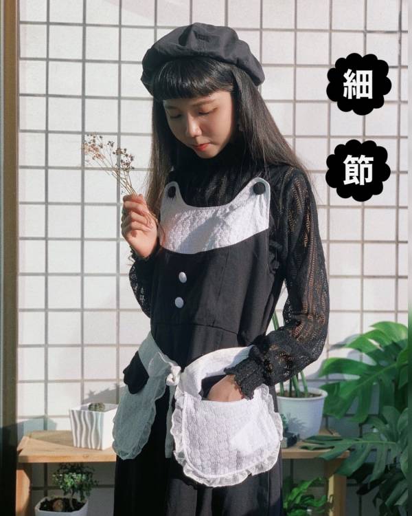 花弧黑裙裝  