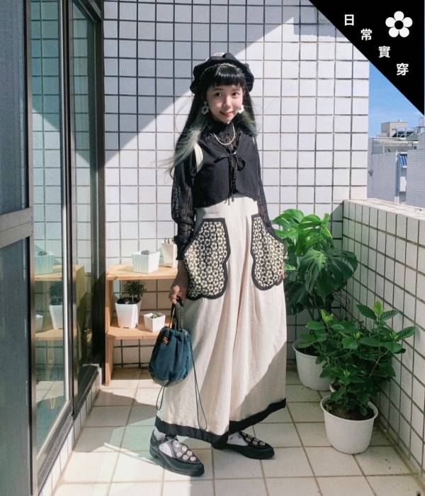 花弧黑褲裝 