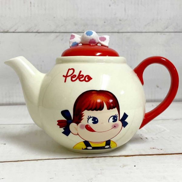 不二家Peko牛奶妹 懷舊立體糖果造型陶瓷茶壺/泡茶壺/花茶壺/奶茶壺 台南好玩.日本商品.日本正版.日本代購.日本雜貨.龍貓娃娃.宮崎駿周邊商品.魔女宅急便.神隱少女.無臉男.霍爾移動城堡.波妞.史努比.角落生物.拼圖.Peko牛奶妹.迪士尼