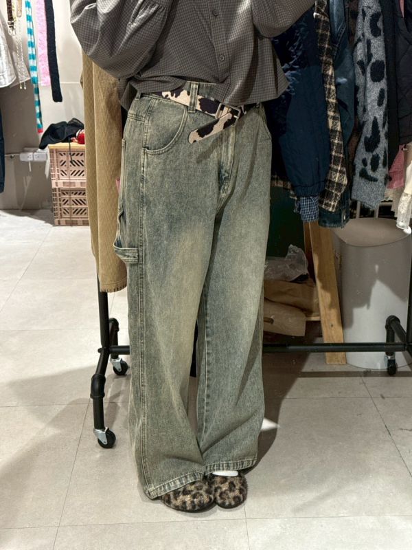 水洗後鬆緊腰口袋拼接小標牛仔長褲 