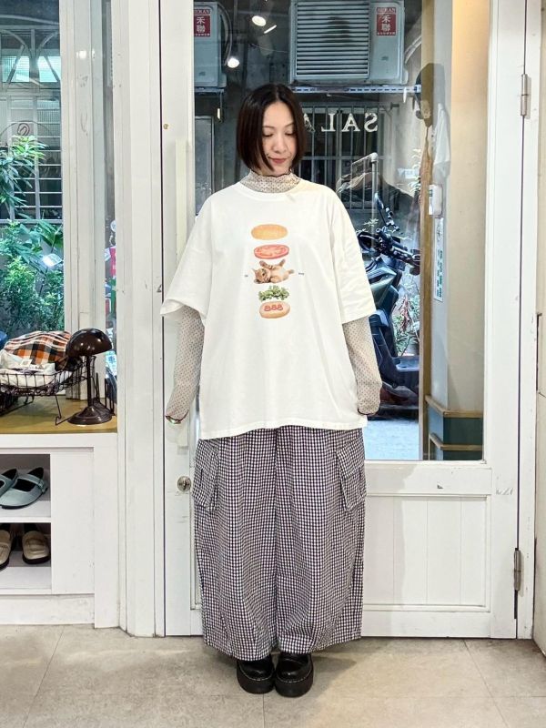 兩側翻蓋大口袋黑白九分格子褲 