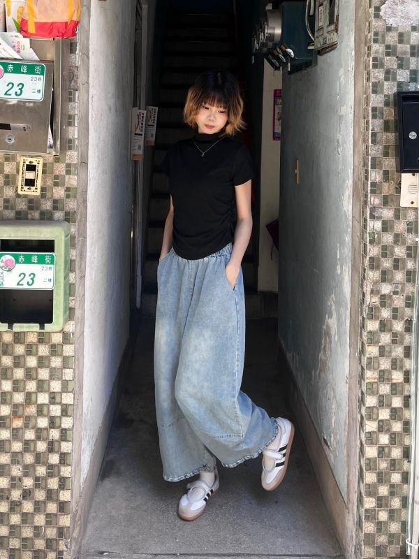 水洗花邊牛仔錐形褲 