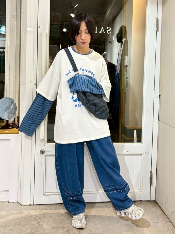 繭型褲腳抽鬚拼接牛仔褲 