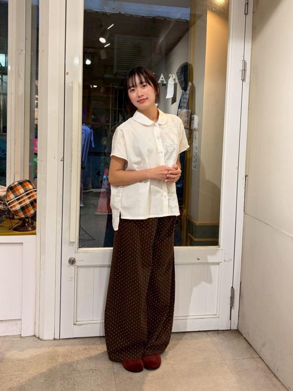 立體花花拼接側開衩前短後長襯衫 