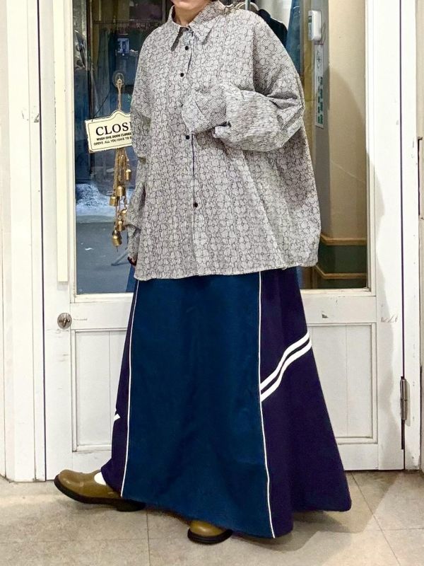 伸縮腰異材質牛仔拼接運動風格寬版A字裙 