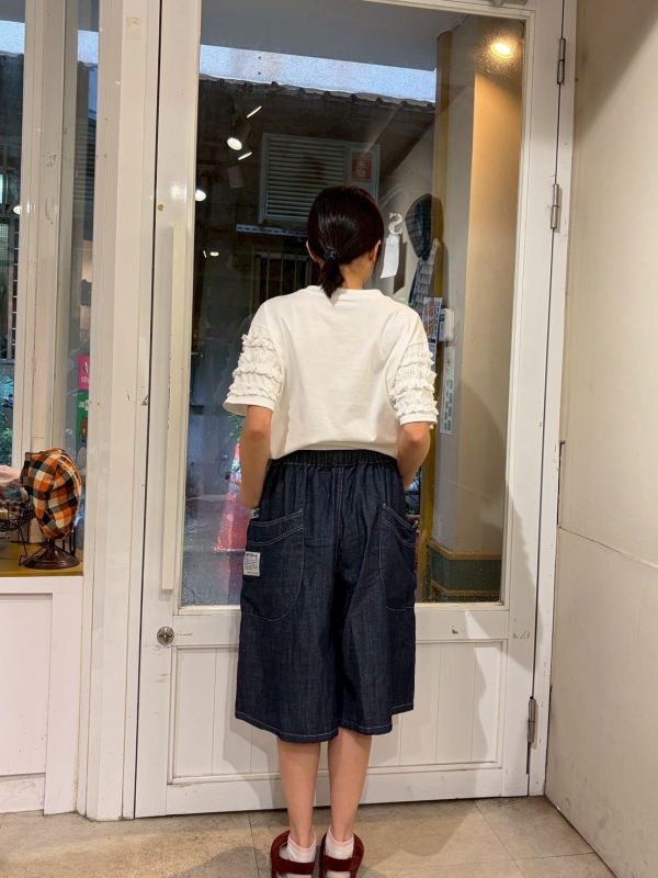 大口袋小布標金屬釦鬆緊腰七分褲 