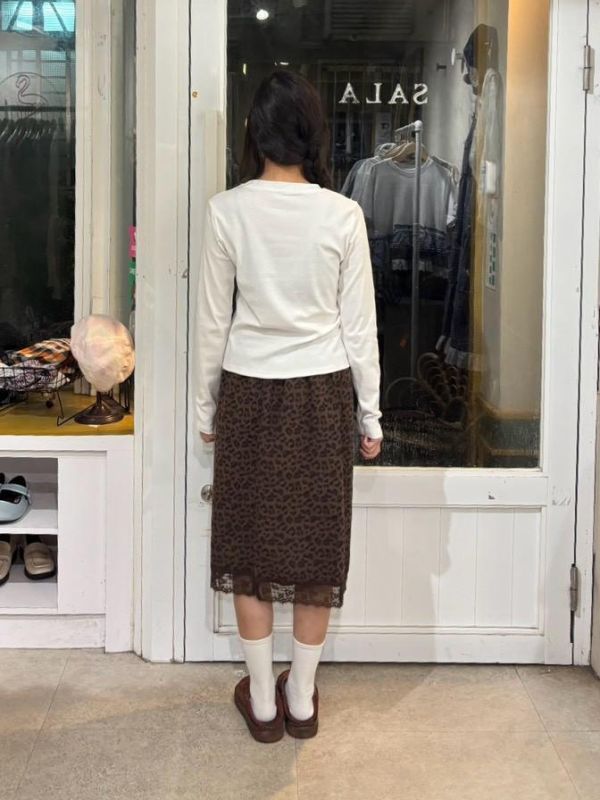毛茸茸豹紋星星卯釘長袖上衣 