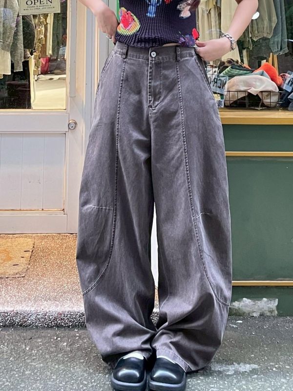 後口袋圓弧車線後鬆緊水洗彎刀褲 