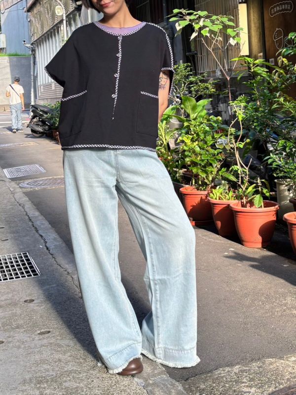 中低腰褲腳拼接抽蓄不收邊牛仔褲 