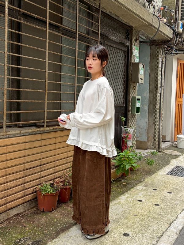 荷葉邊下擺休閒上衣 