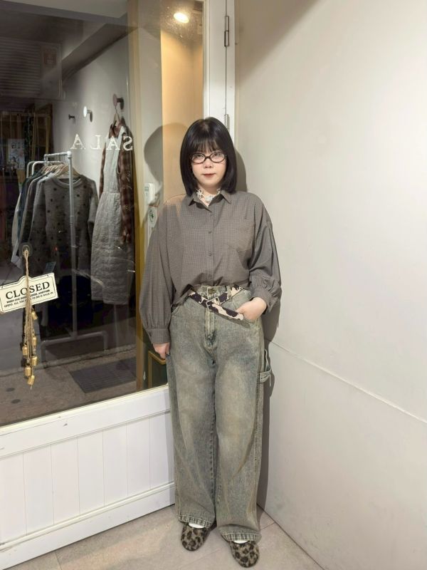 水洗後鬆緊腰口袋拼接小標牛仔長褲 