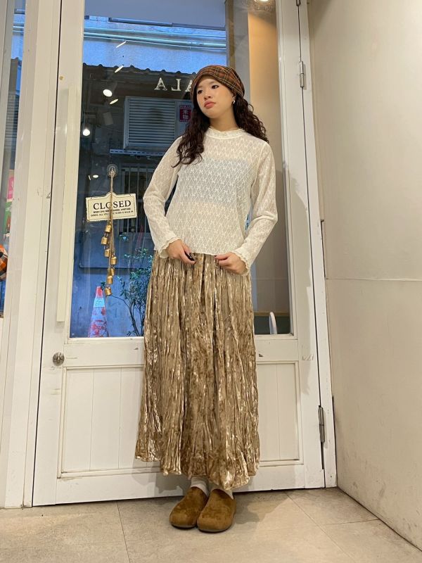 雙層木耳滾邊蝴蝶結菱格壓紋微透膚長袖上衣 