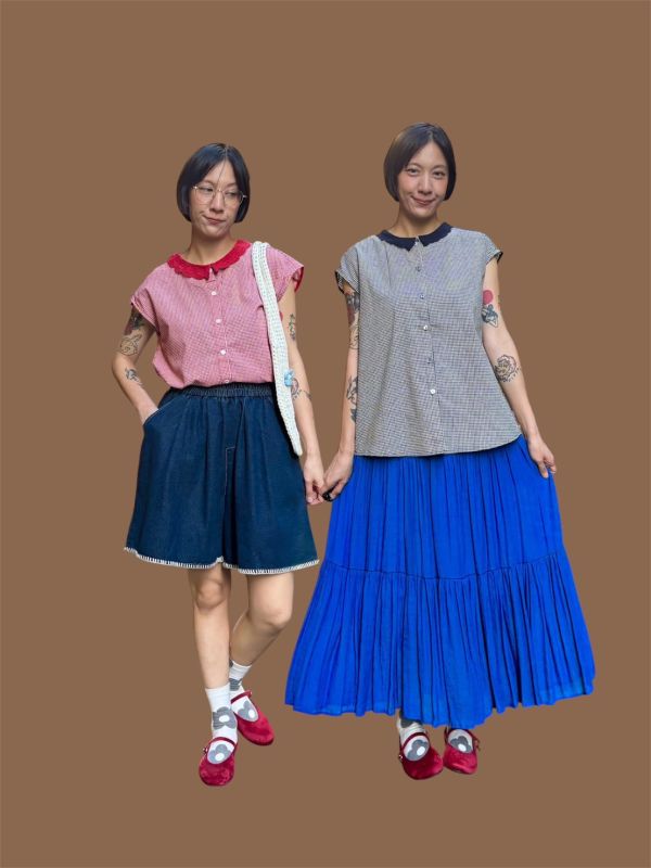 蕾絲小翻領細格子落肩排扣上衣 