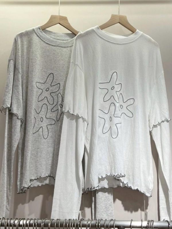 海星花撞色木耳捲邊透膚寬鬆落肩假兩件上衣 