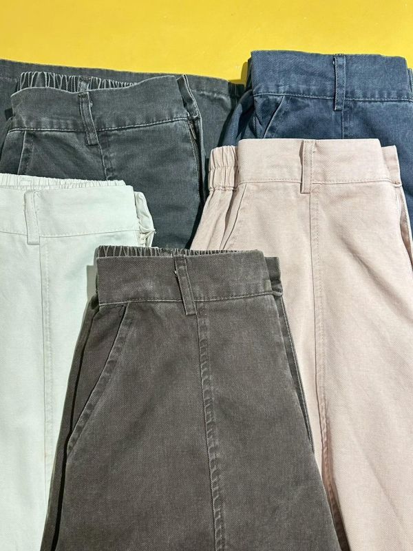 造型圓形車線後鬆緊前後雙口袋繭形牛仔褲 