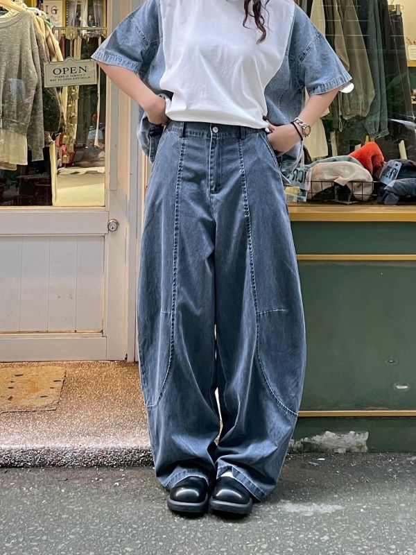 後口袋圓弧車線後鬆緊水洗彎刀褲 