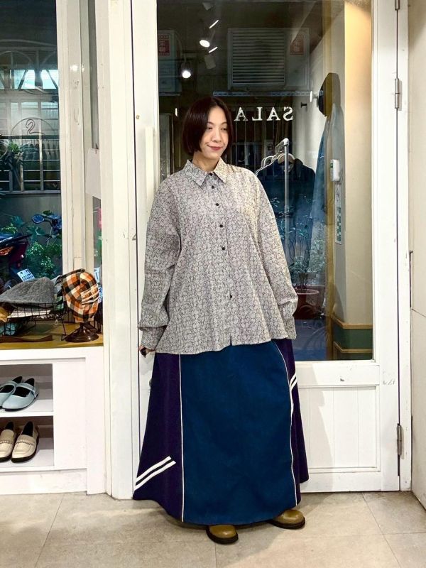 伸縮腰異材質牛仔拼接運動風格寬版A字裙 