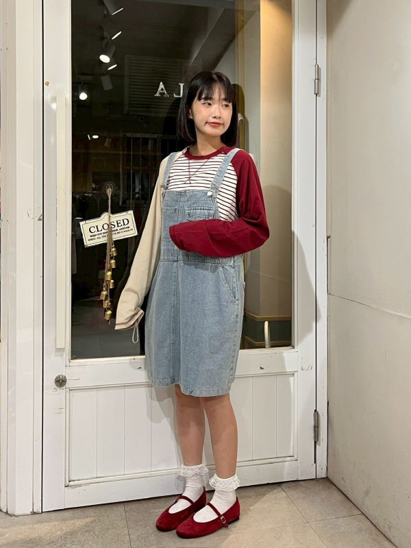 反車線側開衩圓弧下擺撞色拼接袖條紋上衣 