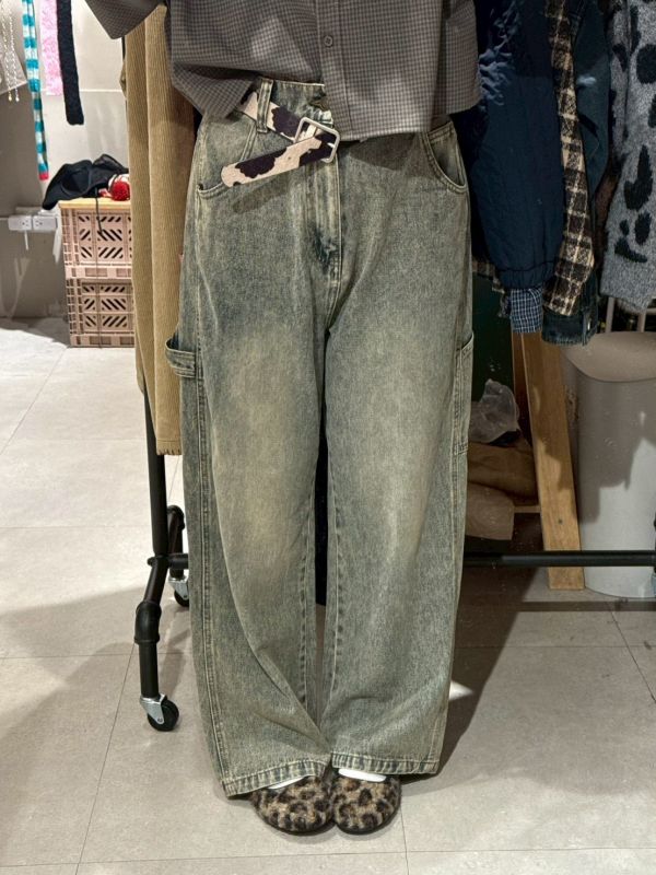 水洗後鬆緊腰口袋拼接小標牛仔長褲 