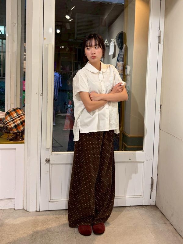 立體花花拼接側開衩前短後長襯衫 