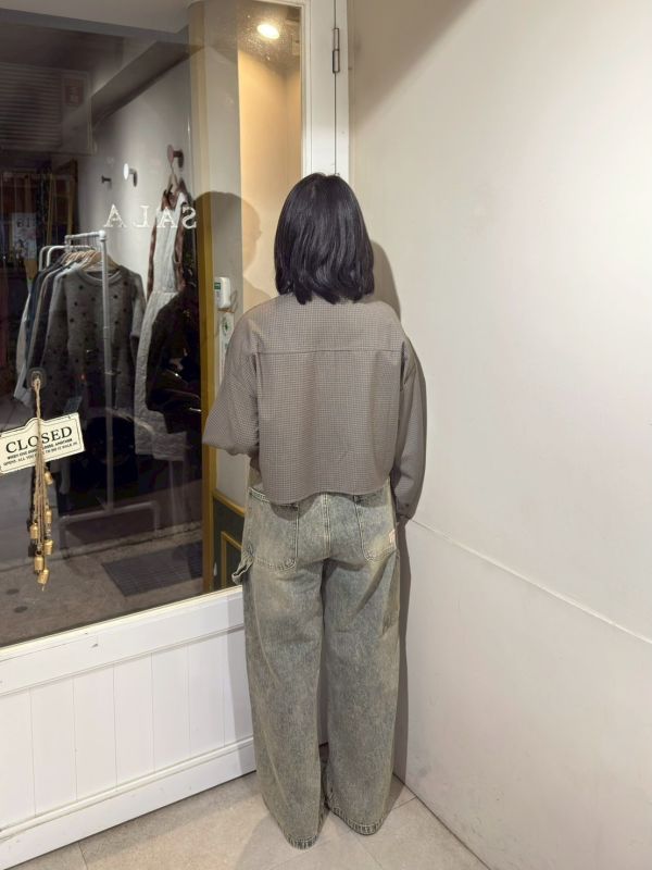 水洗後鬆緊腰口袋拼接小標牛仔長褲 