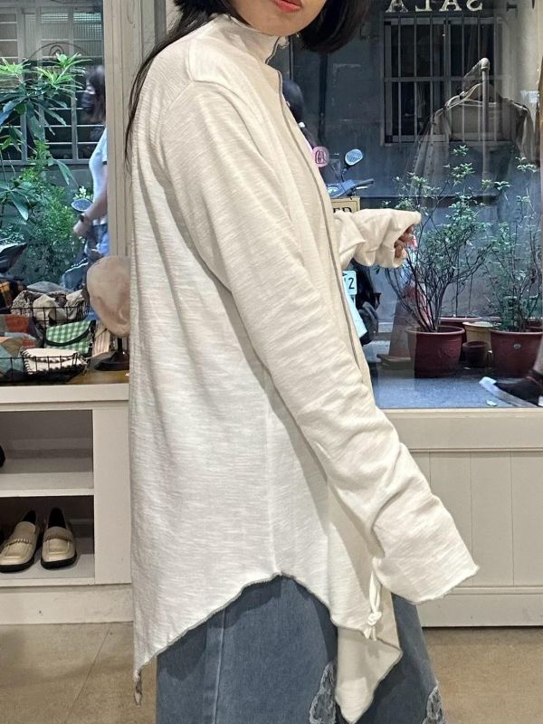不對稱下擺滾邊半領長袖上衣 