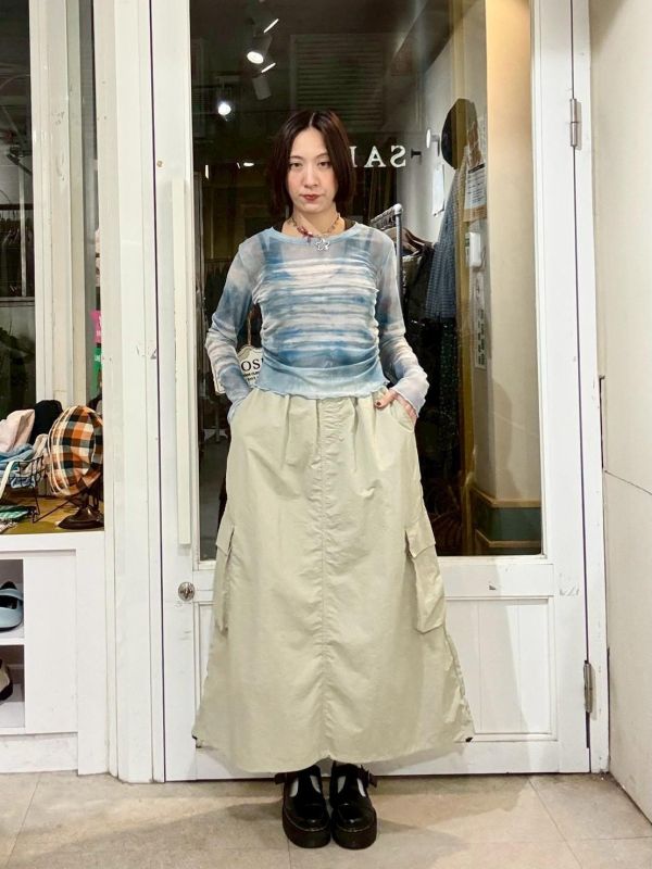 伸縮腰刷刷布兩側立體大口袋下擺抽繩A字長裙 