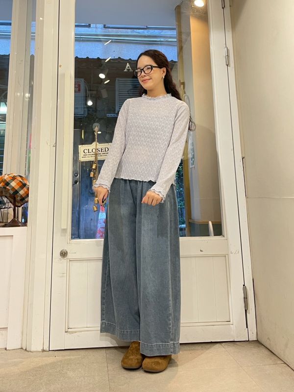 雙層木耳滾邊蝴蝶結菱格壓紋微透膚長袖上衣 