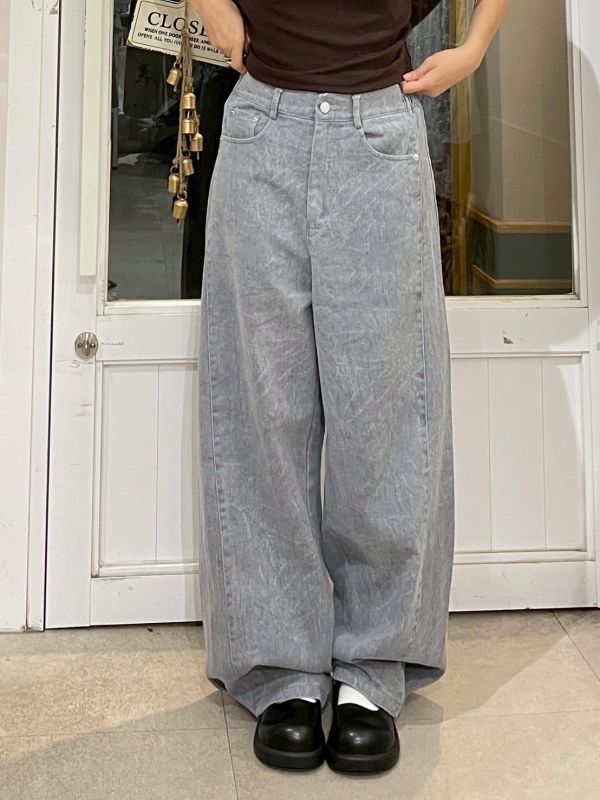 街頭紋路水洗後鬆緊褲管調節鐵扣牛仔寬褲 