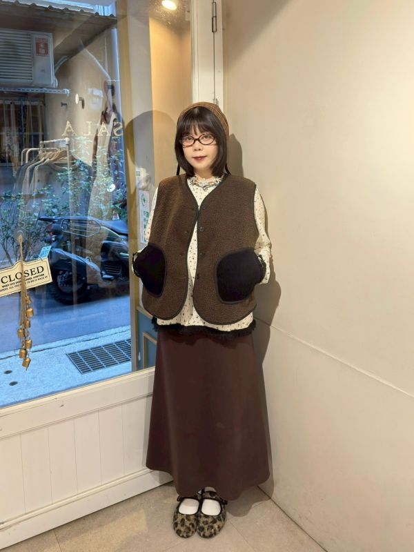 QQ毛排扣燈芯絨拼接口袋背心 