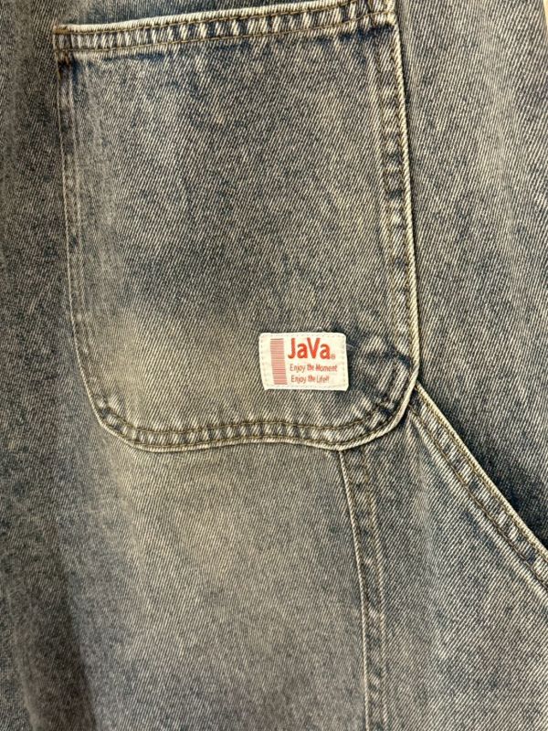 水洗後鬆緊腰口袋拼接小標牛仔長褲 