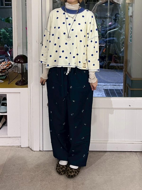 刺繡花花牛仔錐形長褲 