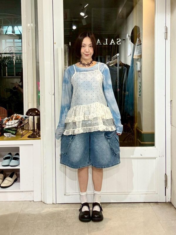 斜翻開立體大口袋白色綁帶五分牛仔寬褲 