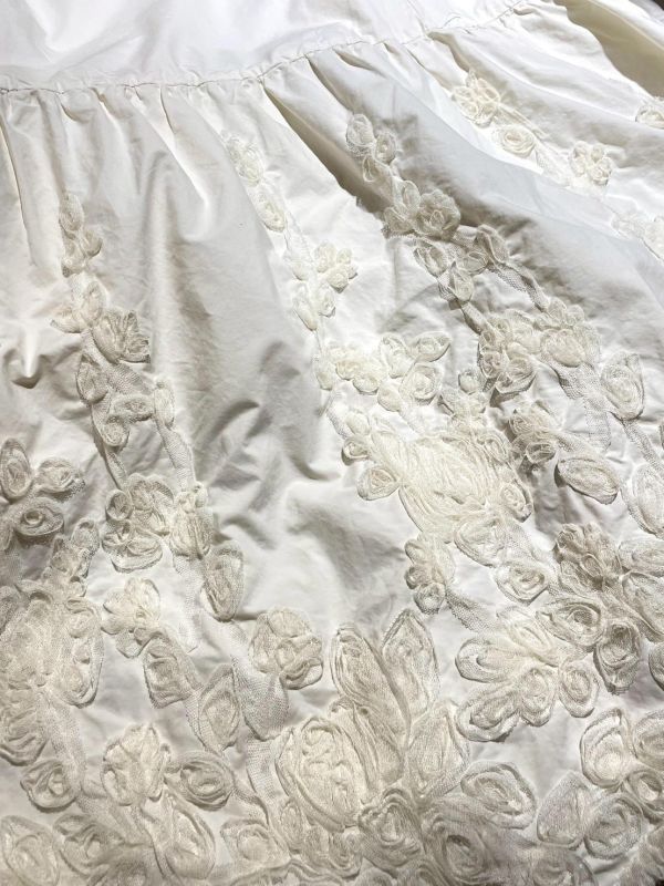 可調節細肩圓弧切線雙口袋立體紗花朵波浪下擺洋裝 