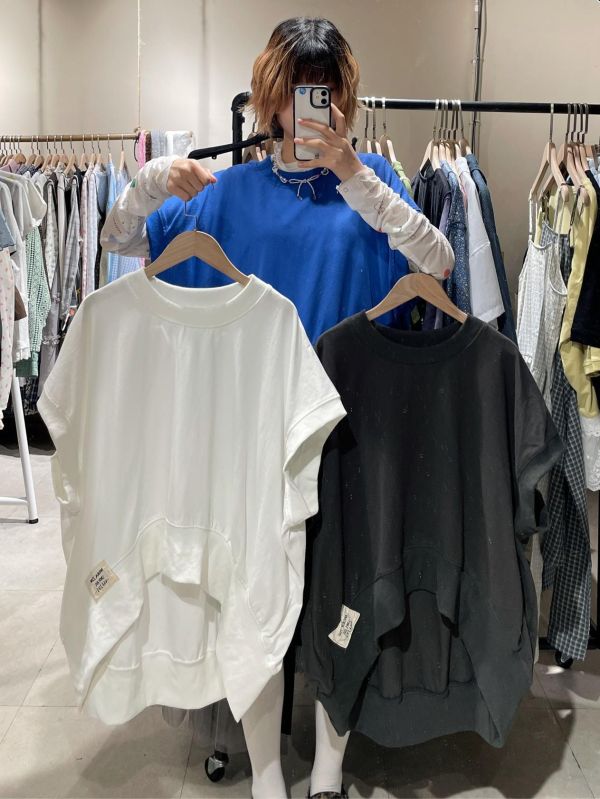 刺繡小標前短後長背心上衣 