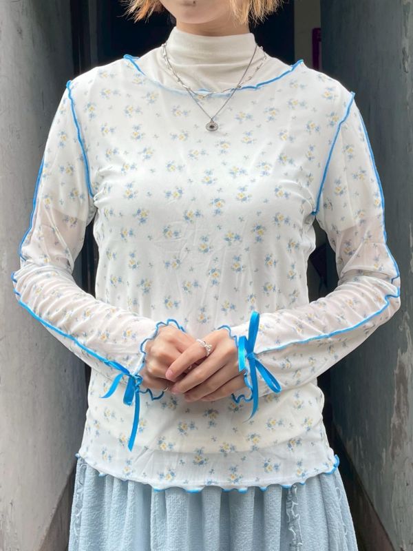 蝴蝶結木耳滾邊碎花透膚內搭長袖上衣 